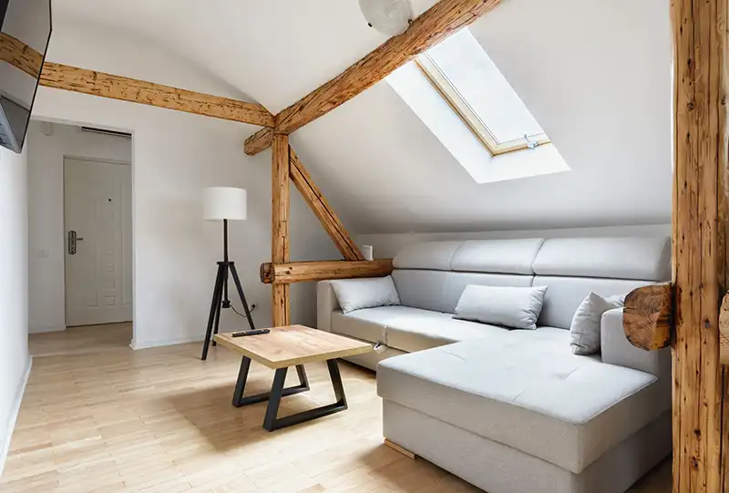 attic loft conversion with beams exposed in Buckingham